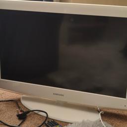 Fully working television, with replacement remote control, sold as seen.