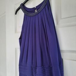 Cadbury dairy milk purple Coast long dress size 6

Bought to be a bridesmaid dress but changed colour scheme so was never worn
Brand new with tags
 Lovely beaded detail around the neck
Gorgeous light floaty dress great for any special occasion