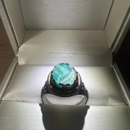 Purchased in an Antique Jewellery store on Kefalonia Island, this ring is a mixture of silver and gold with a large Aquamarine stone on top. Size M