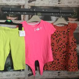 THIS IS FOR A BRAND NEW BUNDLE OF GIRLS CLOTHES

1 X UNITED COLOR OF BENNETTON KNEE LENGTH SHORT - PALE GREEN COLOUR - NEW WITH TAGS
1 X NEXT ORANGE T-SHIRT WITH ANIMAL PRINT - NEW WITH TAGS
1 X PINK T-SHIRT THAT TIES AT THE BOTTO OF THE GARMENT - HAS ONLY BEEN WORN FOR A HOLIDAY SO IN GREAT CONDITION

PLEASE PHOTO