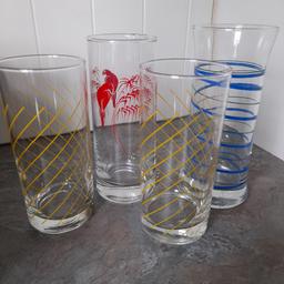 4 beautiful colourful Highball Glasses BNWOT. Purchased 20 plus years ago by my parents from House of Fraser, have been on display in a cocktail cabinet but never used. 2 yellow striped measure 13 cm, 1 x red tropical/parrot design 14cm and 1 x Blue swirls with wider top, 15cm tall. Quality items. From smoke and pet free home. Check out my other items. Happy to combine postage for multiple purchases when possible or collection from DL5 Thanks for looking.