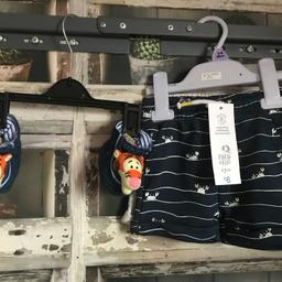 THIS IS FOR A BUNDLE OF NEW ITEMS

2 X PAIRS OF SHORTS - ONE NAVY WITH WHITE CRABS AND ONE PLAIN GREY
1 X PAIR OF DISNEY - WINNIE THE POOH PRAM SHOES DENIM

PLEASE SEE PHOTO