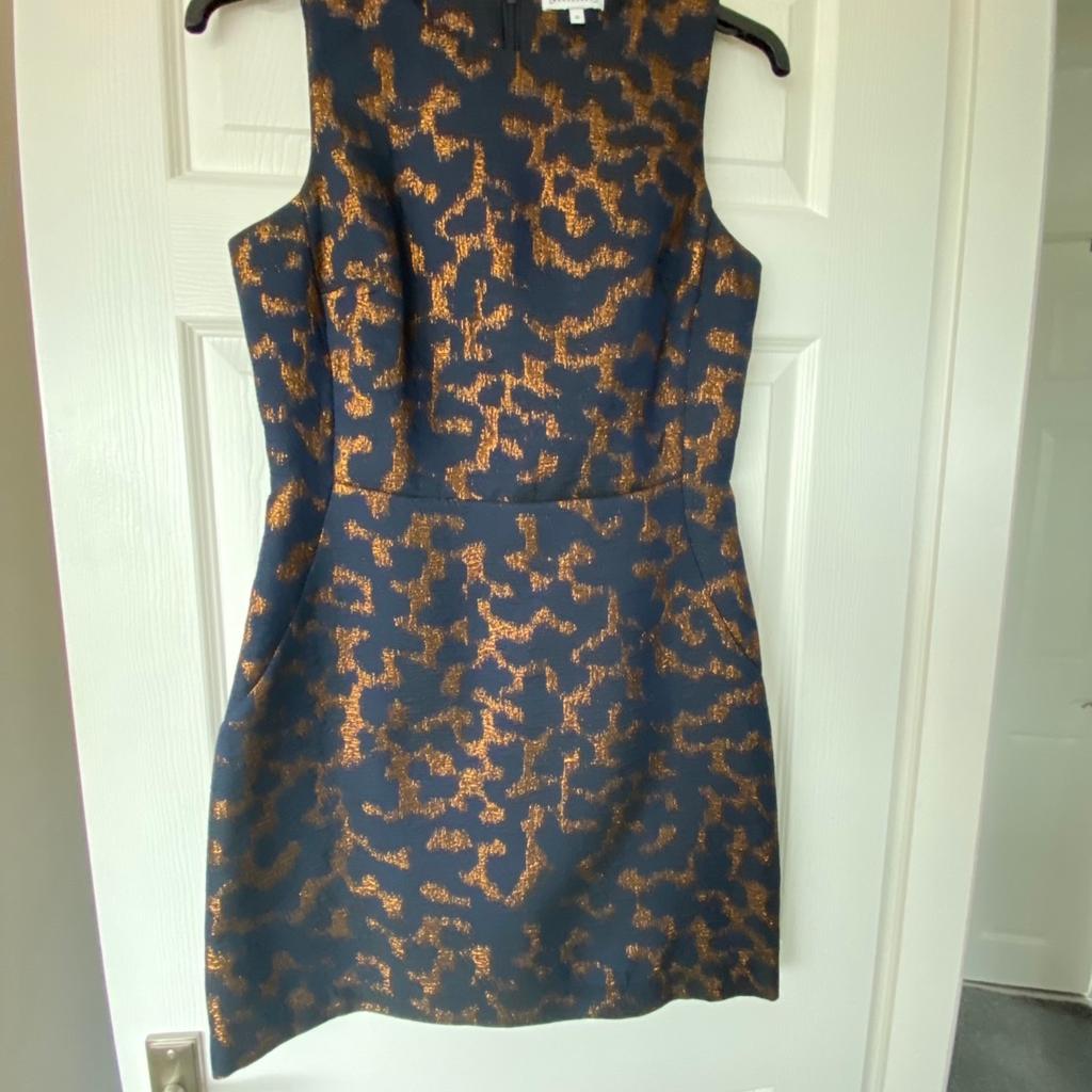 Ladies dress, excellent condition, navy/rust colour. Quality material. Purchased from Warehouse, size 12. Collection or I can post at extra cost of £4.