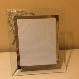 Things Remembered Cristal Glass Mirror Photo Frame. Condition is Used. In fine perfect condition, height 17” inches, width 12” inches, glass frame, round by mirror panel, very beautiful detailed with crystals flora printed on side. Collection only, London NW7.