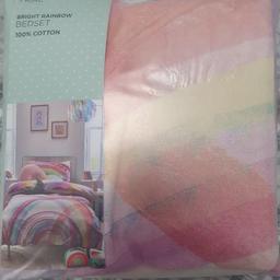 brand new toddler bedding set
bright rainbow from NEXT

did not realise it was for toddler bedding.