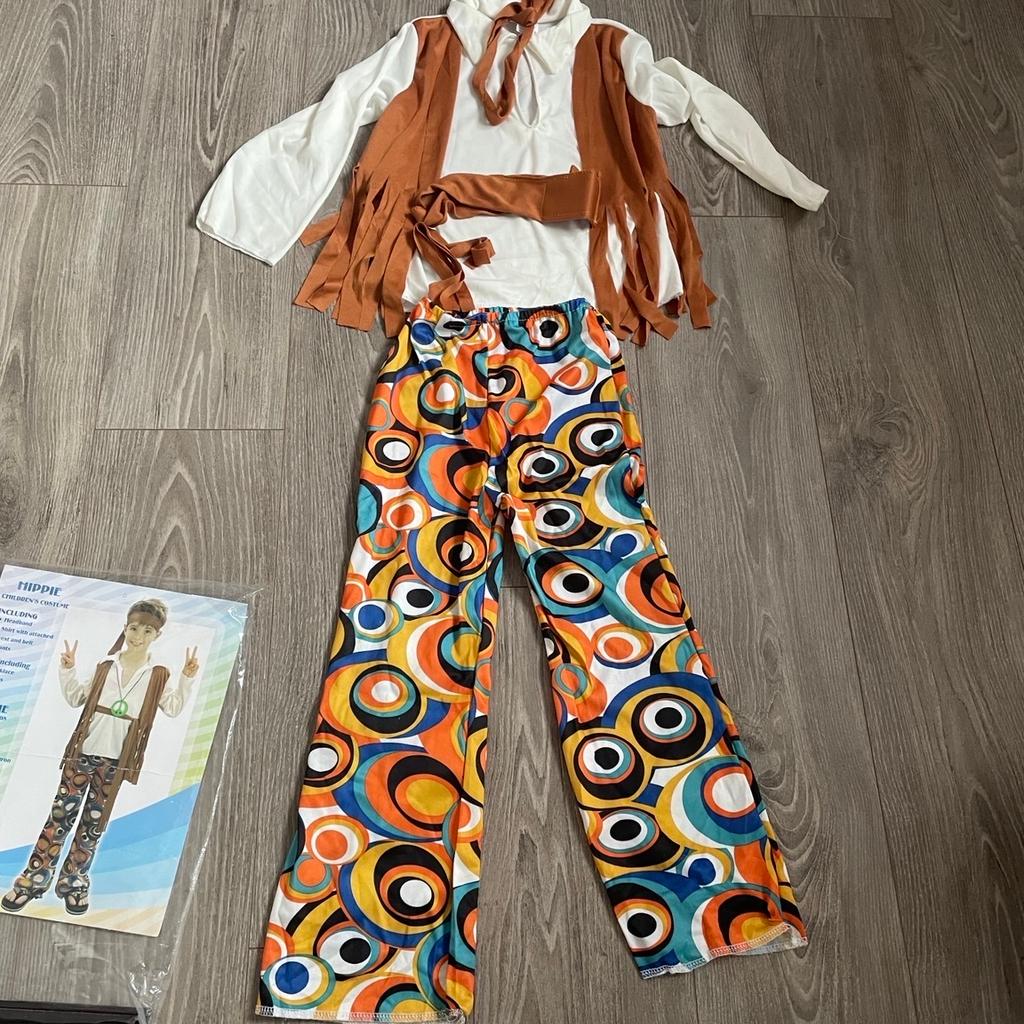 Boys hippy costume size small 110cm to 122cm couple of marks on top only used once