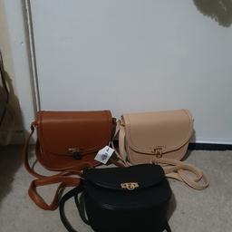 all new. just never got to wore them. 
expandable straps on all and good size to fit phone keys and small purse.
inner zip pocked also. 
£7 each or all for £18
pickup Lozells B19 or Saltley B8