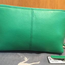 Paul Costello Green Leather Cosmetic Make Up/Wash Bag. Condition new with tags. Dimensions; height 5” inches, width 8” inches, depth 4” inches. Please view my listing for more cosmetic make up wash bags, bags, footwear, activewear and other wear, etc. Collection only, London NW7.