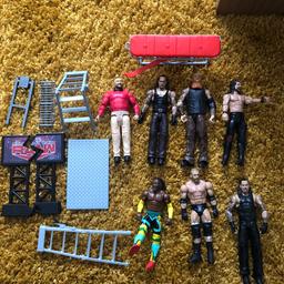 Few wrestling figures and few bits . Please note the bits may have pieces missing . So sold as is . COLLECTION ONLY FROM B62 Halesowen