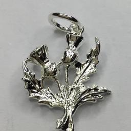Sterling Silver 925 Scottish Double Thistle Charm.

PLEASE NOTE THESE CHARMS ARE STERLING SILVER 925 BUT WILL NOT HAVE ANY HALLMARKS UNLESS OVER 7.78GM.

Specifications:
Weight: Approx 1.78gm
Height: Approx 16.00mm
Width: Approx 16.00mm
Depth: Approx 4.00mm
Metal: 925 Sterling Silver

This charm is beautiful with stunning detailing.
Will come with a velvet gift pouch so perfect for a lovely gift or a treat for yourself.
