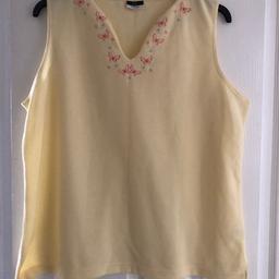 Hardly been worn ladies sleeveless top with decorative embroidery around the V neck line
Size: UK 20
Colour: yellow
Material: 70% polyester & 30% viscose
This top has hardly been worn & is still in excellent condition