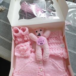 DOLL NOT INCLUDED
Comes with White Flat pack Gift Box with Bow SEE PHOTO'S
Newborn Set with pom pom ties Girls Matinee,Bonnet,Booties,Mittens
First Teddybear
Knitted in Stylecraft DK Baby Pink
Cardigan chest 16"
Length 10.5"
Raglan Sleeve Underarm to Cuff 5"
Bonnet with Daisy at front
Circum 5.5"
Depth 5"
CAN ORDER White or Pink
Knitted by myself
 from a smoke pet free home.
postage extra cost £3.50