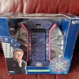 Electronic who wants to be a millionaire game. Excellent condition been opened but never used. money still sealed.