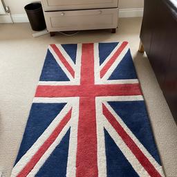 Cox snd Cox Union Jack wool rug.150x92.  Used but good condition. Had been in a bedroom so no heavy wear. Backing has come away in a couple of places (see photos) but you don’t see this when it’s down and it doesn’t affect it. Paid £135 new, looking for £50. Collection only as it’s heavy!