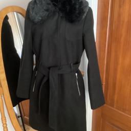 wool coat
Black 
Size 10
Pop stud fasten
Two zip side pockets
For trim hood
Belt
Collection or postage available
