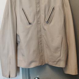 Men's large Nicole Farhi 100% cream leather jacket, good condition. The jacket has a zip front two lower pockets and two zip upper pockets.