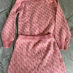 Girls river island thick knit wear set- jumper and skirt, pink size 9-10 with button detail. Machine washable.