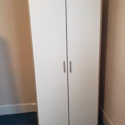 tall, heavy wardrobe.
dimensions: height 193cm, width 86cm, depth 55cm.
white doors, wood effect surround.
can be flat packed for transportation.
collection only.
based from Slough SL1.