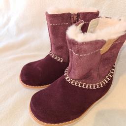 Toddlers Clarks size 4.5 faux fur lined Snow Boots super condition, barely used. Burgundy/ deep wine colour. See photos for condition, size and materials. I can offer try before you buy option but if viewing on an auction site viewing STRICTLY prior to end of auction.  If you bid and win it's yours. Cash on collection or post at extra cost which is £4.55 Royal Mail 2nd class. I can offer free local delivery within five miles of my postcode which is LS104NF. Listed on five other sites so it may end abruptly. Don't be disappointed. Any questions please ask and I will answer asap.