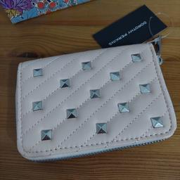 PURCHASED FROM DOROTHY PERKINS AS A GIFT FOR SOMEONE..CHANGED MIND..5 INCHES (13 CMS) LONG X 3.5 INCHES (9CMS DEEP)..QUILTED WITH STUD DETAIL ON FRONT..INSIDE ROOM FOR COINS/NOTES &CARDS..LOVELY BLUSH COLOUR