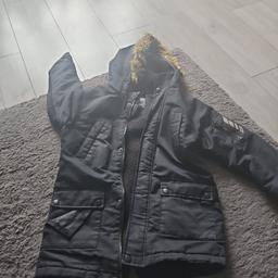 no longer fit its has a little rip on pocket 
age 9-10
if u would like to buy all 3 coats I have put on here I will do a deal