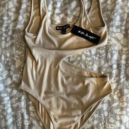 New bodysuit with skin show design still with tag size 12 from top shop