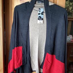 Lovely ladies size 12 waterfall cardigan.
Black, red and dark cream coloured