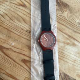 Unisex wooden watch with leather strap.
Quiet unusual style watch. Built and designed with all natural materials.