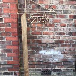 reclaimed Wrought Iron large hanging basket bracket/house /shop sign. 
This is a lovely large reclaimed hanging basket bracket , shop or house, sign, 
It has the number 205 hanging under the bracket but can be removed if needed 
It’s very attractive in original condition 
Viewing welcome