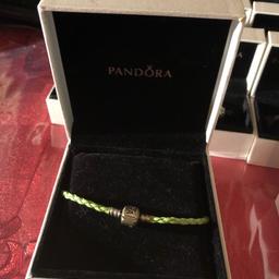 Pandora woven bracelet 
In excellent condition 

Bought this but didn’t wear it 

Been in box 

Size 20cm
Colour green 

Collection or can post