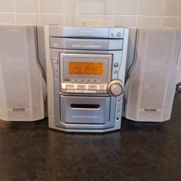 Great item and have used it everyday.
Speakers are great and can be played quite load and clear.

Radio
5 CD changer
Tape 

All working.

Comes with remote control.

100w speakers

All silver

Thanks for looking.