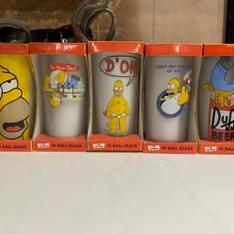 A set of 5 Simpson’s collectible pint glasses