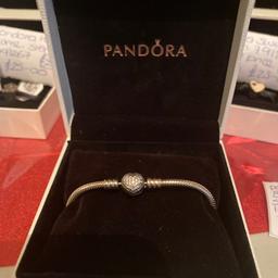 Pandora moments sparkling heart bracelet 

Comes in original box & bag 
Sparkling Silver Cubic zirconia 
Size 16cm  
Colour silver 

Collection or can post !!! 

Pandora price £60.00