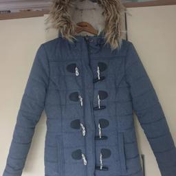 Ladies winter coat with attachable trim in excellent condition comes from pet and smoke free home!