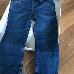 Kids age 4-5 TU jeans. NEW with tag. Adjustable waist. From a smokefree and petfree home. 