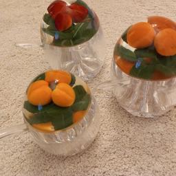 - 9-piece set of perspex/acrylic decorative pots including 1 apricot, 1 orange and 1 strawberry fruit design marmalade/jam table pots with lids and matching spoons. 
- Perfect condition.