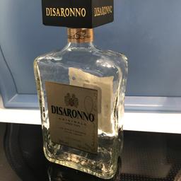 Disaronno Empty Bottle With Screwtop 700ml Large bottle. Ideal for crafting, display, lamp stand, storage, decorating as a Chanel perfume bottle etc. etc.

Perfect. with intact labels and original square screwtop. From a smokefree and petfree home.

height 22cm
width 10.5cm
depth 6cm

Thick glass with a wavy texture.