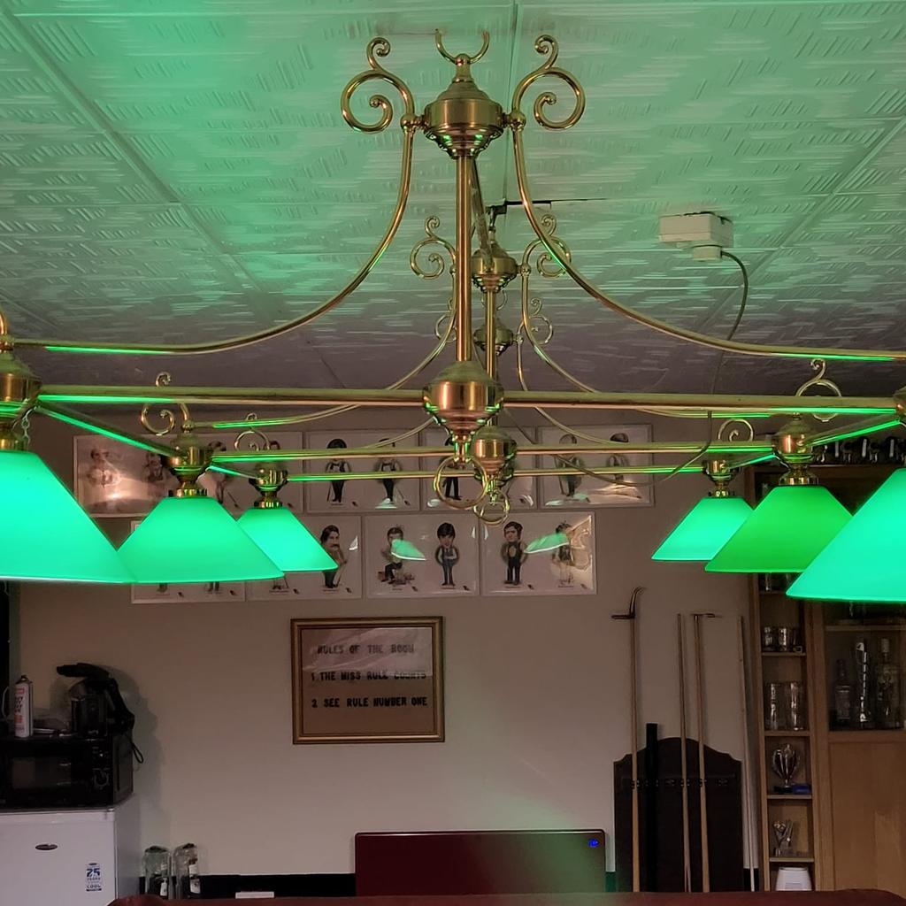 Ornate brass full size snooker table light,
When bought new it was £1299.00,
6 green glass shades with bulbs,
Easily dismantled in to smaller pieces, with numbered parts, it is easy to rebuild.
Beautiful piece of antique lighting