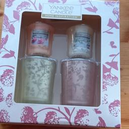 Yankee candle gift set containing 2 candles and 2 candle holders brand new box is damaged in one corner