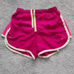 Karrimor XLite Running Shorts size 8. Bright pink with yellow contrasting trim. Breathable. Very good used condition, worn and washed a few times. See photos for more on condition. Elasticated drawstring waist. Back pocket with zip. From smoke and pet free home. Check out my other items. Happy to combine postage for multiple purchases when possible or collection from DL5. Thanks for looking.