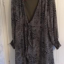 Stunning grey, taupe & black long sleeve outer wear piece. Can be worn open as a cover up or for a wedding over an outfit. Wow factor . Long sleeves. By Quiz size 14. Smoke & pet free home