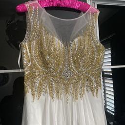 Prom or bridesmaids dress very good condition no marks on it gold and white