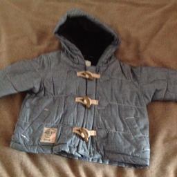 Next coat
Size upto 3 months 8kg 14lb
Fleece lined 
Zip and toggle fasten
Collection or postage available