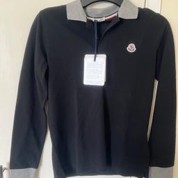 Boys Black moncler top age 14 year. Fits Size 6 UK adult. Brand new never been worn with tags on