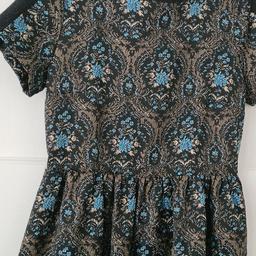 Lovely Patterned multi-coloured dress. Suitable for most occasions. Size 16. Worn only a few times, in great condition.