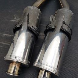 Kawasaki zzr1200 exhaust end cans. Left and right  with hangers included.