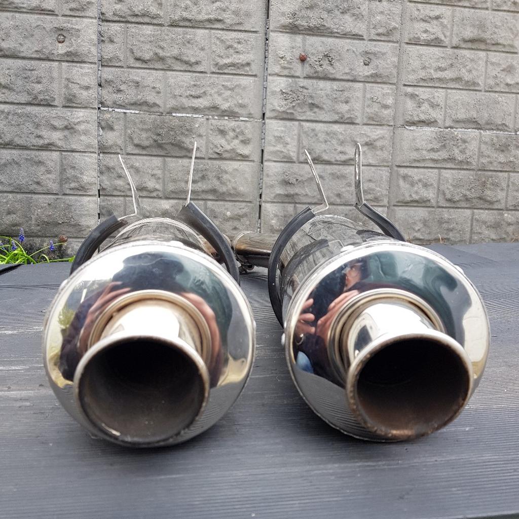 Kawasaki zzr1200 exhaust end cans. Left and right with hangers included.