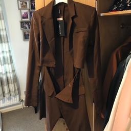 Pretty little thing brand new . Labels still on . Tall, chocolate cut out blazer dress size 8 puo