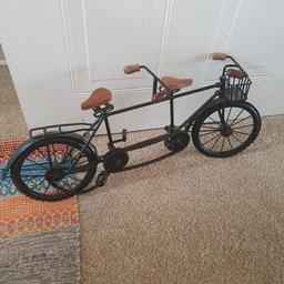 Metal decorative tandem bike. metal frame and wooden seat and handles