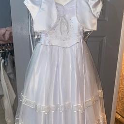 seeing lovely holy communion dress . would say 8 to 10 . it has side that you can let in out out if needed  . collection welcome